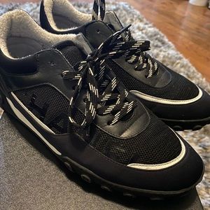 Black and white Chanel sneakers